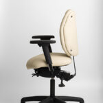 Ergochair Adapt 200 ergonomic chair in cream upholstery, side view showing sculpted backrest