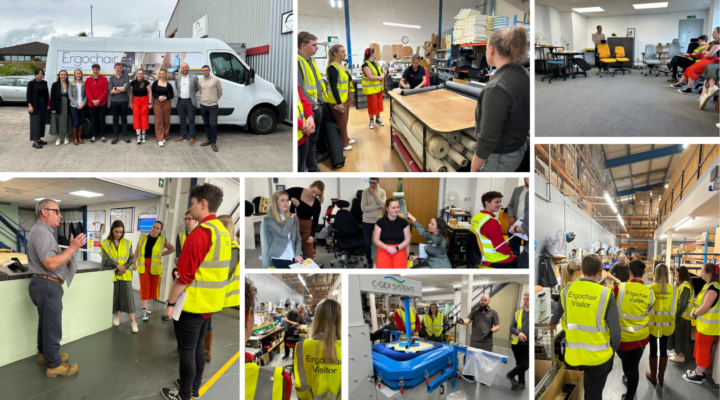 Ergochair team and visitors in high-visibility vests on a factory tour of the Ergochair manufacturing facility.